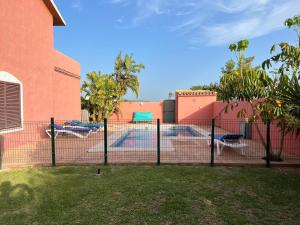 Agradable casa de playa con piscina. El Palmar