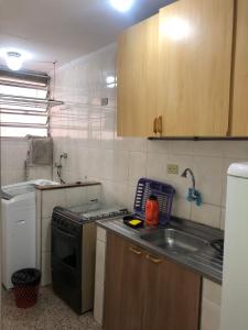 Apartamento Las Palmas - 100m da Praia Pitangueiras, Estacionamento, Café da Manhã