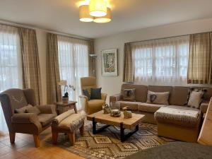 Laax Cozy Apartment Ski Bus in front of the Door