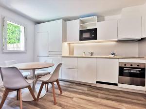 Les quatre loges - joli t2 jardinet et parking *3