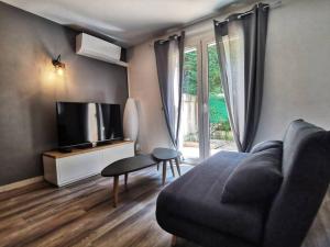 Les quatre loges - joli t2 jardinet et parking *3