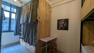 Bed in 6-Bed Mixed Dormitory Room room in Urban Jungle Hostel