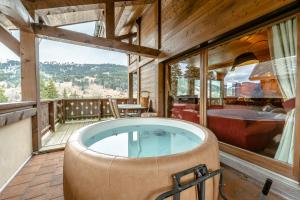 chalet Amitie familial de luxe avec JACUZZI, HEBERGEMENT MULTIPASS ETE, WIFI fibre, 150 m des pistes de ski et randonnées