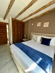 PUERTA DE LA VILLA Apartamentos y Habitaciones