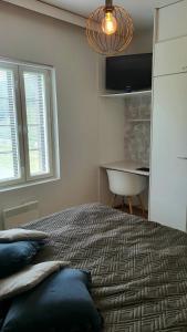 Loma-asunto Tahkon Alppitalossa