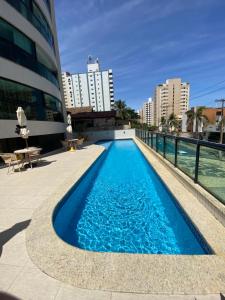 Quarto, sala, cozinha e garagem com praia 400 metros