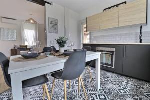 Appartements Le Bosco - Parking et calme : photos des chambres