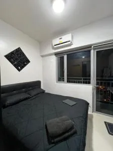 1BR Condo with Lazy Boy and Videoke in Grass Residences at SM North Edsa - Bahaytoro