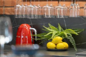 Exclusive Grey and Red Apartment in Warsaw Center by Noclegi Renters