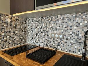 Appartements Studio Les Chalmettes 4 Personnes au pied des Pistes Wifi - Balcon - Parking : photos des chambres