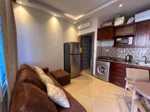Cosy Studio on the First Floor with lovely Terrace and Personal Garden Area, Pool View and Free Beach Access in Sharm Hills Resort
