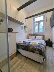 Tiny Condo w Floor Heating, Washer, Dryer, & 55" TV