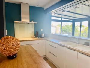 Maisons d'hotes Le Cottage - Jolie Maison a Buxerolles : photos des chambres