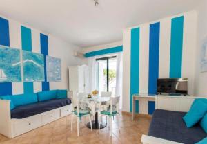 One-Bedroom Apartment with Terrace and Sea View room in Residence Le Terrazze