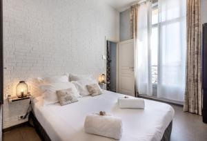 Appartements Residence du Louvre - Apartments - Prime location Palais & Croisette - Luxury Stay by LRA Cannes : photos des chambres