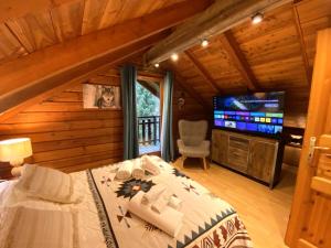 Chalets LE LOUP Chalet en bois : photos des chambres