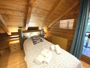 Chalets LE LOUP Chalet en bois : photos des chambres