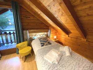 Chalets LE LOUP Chalet en bois : photos des chambres