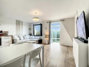 Maisons de vacances La Pommedepin Ravissante maisonnette avec jardin : photos des chambres