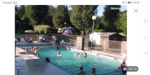 Campings Charmant Mobil home style chalet : photos des chambres