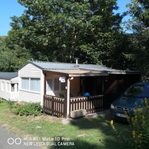 Campings Charmant Mobil home style chalet : photos des chambres