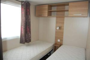 Campings Mobil-home 3 chambres 6-8 pers - Camping Lac des Reves, Lattes : photos des chambres