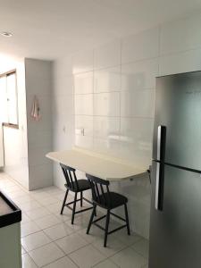 Apartamento para temporada na Praia do Morro - ED GRAAL