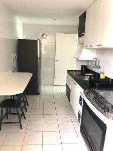 Apartamento para temporada na Praia do Morro - ED GRAAL