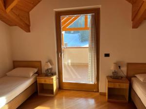 Attico in Legno ad Andalo, di fronte alle piste da sci