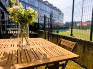 Apartamento con jardín y piscina comunitaria - Пуентедеуме