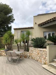 Villas Mas Contemporain classee 3 etoiles -Piscine-A 400 m de la mer : photos des chambres