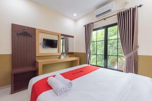 RedDoorz Plus @ La Asiana Guest House
