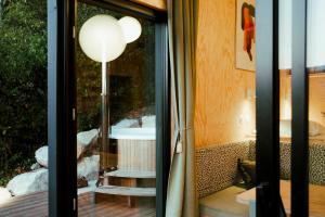 Appartements Ecolodge Acme Jacuzzi vue lac : photos des chambres