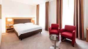 Double Room Grand lit room in Hotel Rochat