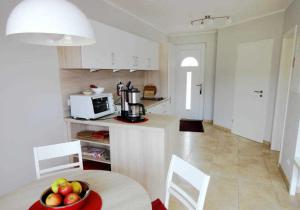 Küstenwald - Ferienwohnung Abendsonne