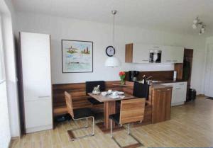 Küstenwald - Ferienwohnung Igelring H