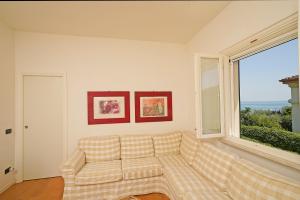 Villa Daniela con giardino privato recintato e barbecue, vicino alla spiaggia