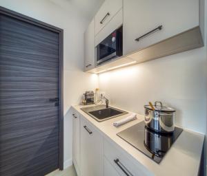 Appartements Le spacieux 4 : photos des chambres