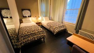 Twin Room with Two Twin Beds room in Touchstone Hotel - City Center
