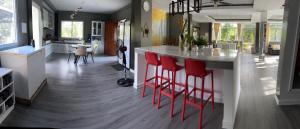 INATO SUITES Rm 1 1 queen bed and a pullout sofa bed