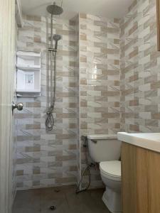 Patong Vacation Rentals - Located in the Heart of Patong, Studio Apartments walking distance to the beach, King Bed, Kitchen, Private Bathroom, Seating Area, 65" Smart TV with Free WIFI