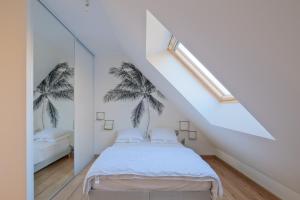 Maisons de vacances La Brise Tropicale - Belle maison avec jardin : photos des chambres