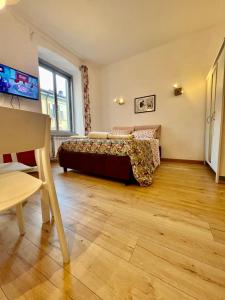 Alla Scalinata del Teatro Rossetti confort suites parcheggio