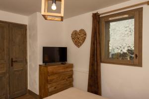 Appartements les 7 laux immobilier chalet E : photos des chambres