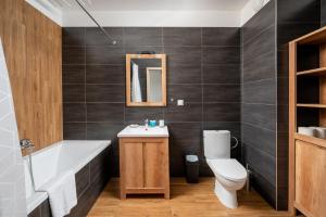 Krzyżówki Comfort Apartment by BookingHost