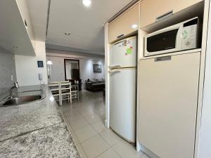 B102 - Apto 2 quartos p 6 pessoas com vista lateral do mar