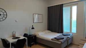 Best location city center studio with balcony and free parking Kotimaailma apartments