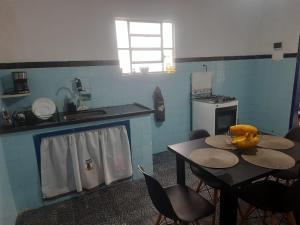 Casa Arraial 2 quartos, 1 banheiros com garagem