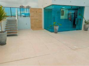 Flat com piscina a 200m da praia