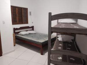 Pé na areia Casarão do Morcego